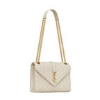 Envelope medium in quilted grain de poudre embossed leather.